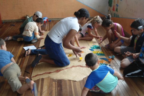 A Child's Garden of Peace Carine Vieira with the children at the community center garden in Santo Ângelo, Brazil A Child's Garden of Peace Carine Vieira with the children at the community center garden in Santo Ângelo, Brazil